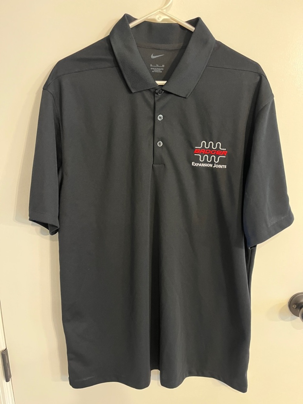 Men’s Size XL Nike Badger Expansion Joints Brand Black Polo Shirt